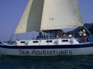 The Sea Adventures Catamaran sailing off the west coast of Koh Chang